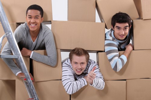 Professional moving crew handling a removal truck hire service